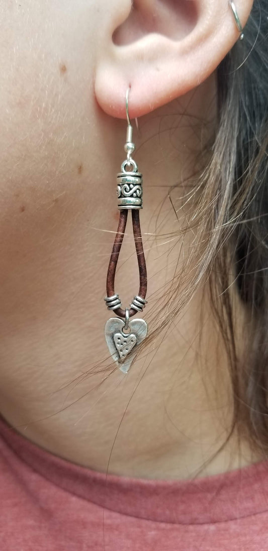 Leather drop earrings with a silver heart, leaf or cross charm