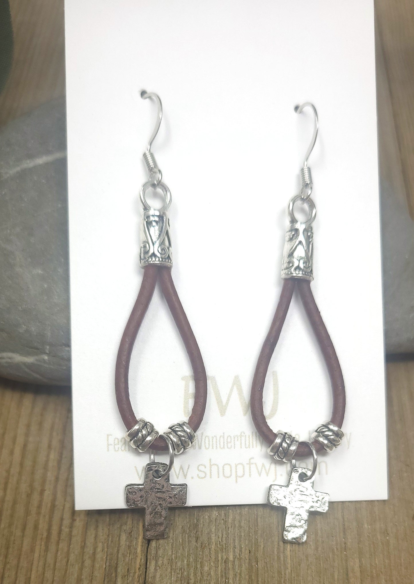 Leather drop earrings with a silver heart, leaf or cross charm